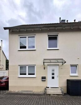 Doppelhaushälfte mit Garage, Stellplatz und Garten im familienfreundlicher Umgebung in Leeheim - Riedstadt