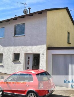 Einfamilienhaus mit Garage und großem Grundstück in Dudweiler-Herrensohr - Saarbrücken