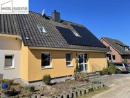 Energetisch saniertes verbundenes Einfamilienhaus mit Keller und Garage - Tostedt