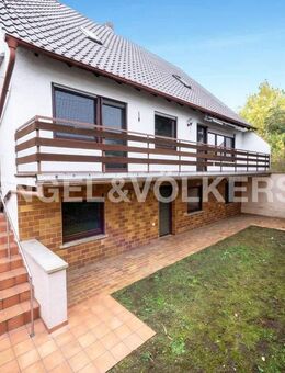 Familienfreundliches Einfamilienhaus mit sonnigem Garten und Garage in Grafenrheinfeld - Grafenrheinfeld