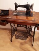 Alte Singer Tetnähmaschine Gusseisenes Gestell im guten Zustand. in 53340