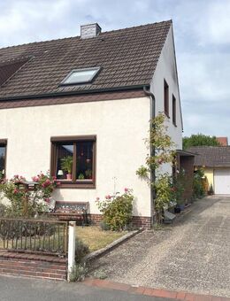 PURNHAGEN-IMMOBILIEN - Gepflegte Doppelhaushälfte mit Garage in ruhiger Lage von Blumenthal-Bockhorn - Bremen