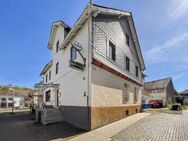 Mehrfamilienhaus mit verpachtetem Ladenlokal in Dietzhölztal - Dietzhölztal