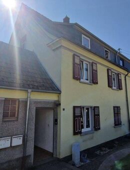 2 Mehrfamilienhäuser mit 6 Parteien und kleinem Anbau - Wissen