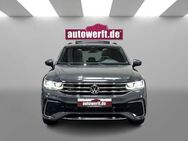 VW Tiguan 2.0 TDI 4M DSG R LINE PANO AHK CAM NAVI 20Z CARBON - Ahrensburg