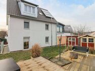 Gehobenes Mehrfamilienhaus mit 3 Wohneinheiten und tollem Garten in gefragter Lage - Magstadt