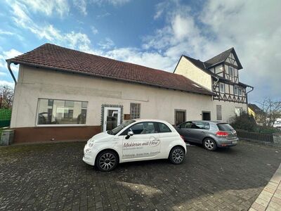 Geräumiges Einfamilienhaus mit 203 m² Wohnfläche und 110 m² Gewerbeeinheit auf 1000 m² Grundstück!