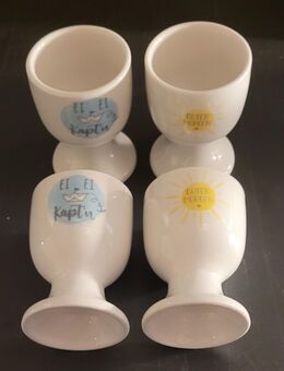 Eierbecher 4 Stk. mit 2 verschiedenen Motiven + Spruch. TOP ZUSTAND - Völklingen Zentrum