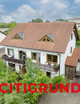 Unterschleißheim - Gepflegtes Mehrfamilienhaus mit drei Wohneinheiten und sonnigem Garten - Unterschleißheim