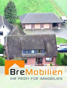 3 Häuser - eine Kapitalanlage! In Achim-Borstel mit 4 Garagen & Weideland! - Achim