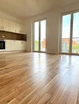 Erstbezug: Geräumige 4-Zimmer-Wohnung mit Terasse, hochwertiger EBK und 2 Bädern - Leipzig