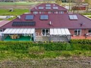 Traumhaftes Wohnen auf einer Ebene: RMH mit Panoramablick ins Grüne! - Ihlow (Niedersachsen)