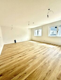 Moderne 2-Zimmer-Neubauwohnung mit Barrierefreiheit, separater Ankleide sowie schönen Besonderheiten - Traunreut