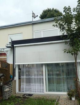 Ihr neues Zuhause: Ernst-May-Reihenmittelhaus mit Wintergarten in Praunheim! - Frankfurt (Main)