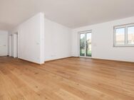 Neubau: Gemütliche 3-Zimmer-Wohnung mit großzügiger Terrasse und Gartenanteil im Erdgeschoss - Plößberg