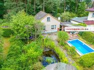 IMMOBERLIN.DE - Sanierungsbedürftiges Haus mit Südterrasse & Garage in sehr harmonischer Lage - Birkenwerder