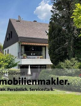 freistehendes Einfamilienhaus mit Einliegerwohnung in bevorzugter Wohnlage mit Garten und 2 Garagen - Trier