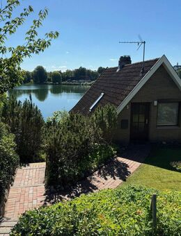Einfamilienhaus mit ELW am Trentsee mit Schlossblick und Steg, provisionsfrei - Plön