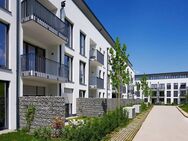 Exklusive 3-Zimmer-Neubauwohnung mit Balkon und idyllischem Blick auf die begrünte Parkanlage - Haar