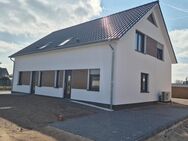 Neubau-Doppelhaushälften in neuem, naturnah gelegenem Wohngebiet von Wagenfeld - Wagenfeld