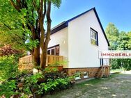 IMMOBERLIN.DE - Ersteinzug! Sehr attraktives Haus mit Südterrasse, Garage & Sonnengarten in naturverbundener Lage - Stechlin