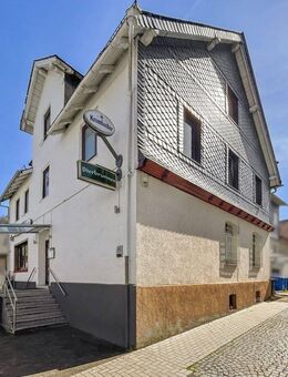 Mehrfamilienhaus mit verpachtetem Ladenlokal in Dietzhölztal - Dietzhölztal