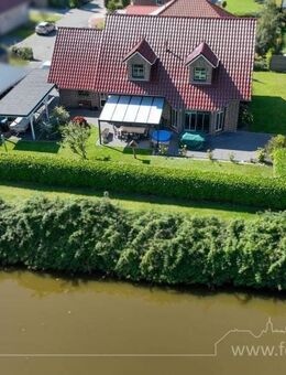 Wie neu: Traumhaus mit Wassergrundstück, PV-Anlage und Speicher im Fischerdorf Ditzum - Jemgum
