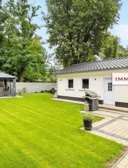 IMMOBERLIN.DE - Topzustand! Traumhaftes Haus mit Südterrasse, Sonnengarten, und Erdwärmepumpe in ländlicher Lage - Am Mellensee