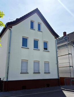 Solides Einfamilienhaus mit tollen Entwicklungsmöglichkeiten - Sanierung notwendig! - Buseck