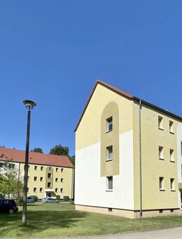 Erdgeschosswohnung mit Balkon, eigenem Garten. Ohne Käuferprovision! - Rauen