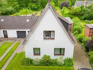 Zum Selbstgestalten: Gemütliches Einfamilienhaus mit Seeblick, Garten & 2 Garagen in Gandekersee. - Ganderkesee