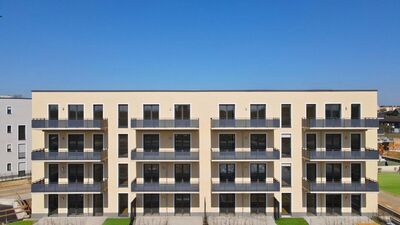 Fünf Höfe Porz ein Familienparadies: 4-Zimmer Erdgeschosswohnung mit direktem Spielplatzzugang