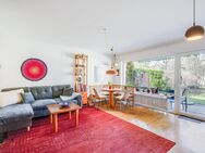 AIGNER - Charmante Erdgeschosswohnung mit großem Garten und Schwimmbad - München
