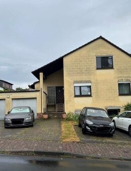 Kapitalanlage! 4-Zimmer-Eigentumswohnung mit Balkon, Gartenanteil, Stellplatz und Garage in Niedernhausen - Niedernhausen