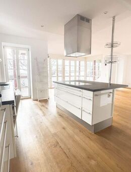 Exklusive 4-Zimmer-Erdgeschosswohnung mit Südveranda und Gartenanteil in zentraler Lage von Tutzing - Tutzing