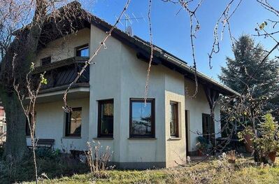 Einfamilienhaus mit Fußbodenheizung und Doppelgarage in ruhiger Dorflage