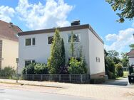 PURNHAGEN-IMMOBILIEN - Bremen-Farge / Rekum - Kapitalanlage - freist. 4-Parteienhaus mit 3 Garagen - Bremen