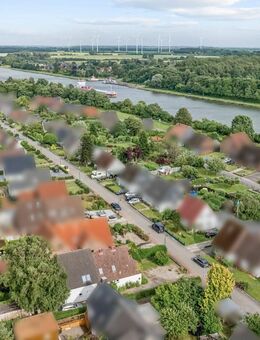 Einfamilienhaus mit Einliegerwohnung am Nord-Ostsee-Kanal in Sehestedt - Sehestedt