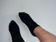 Schwarze getragene Socken - Nordharz