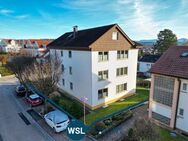 Stattliches Wohnhaus mit 3 Wohnungen, 4 Garagen, 2 Stellplätzen und Garten in guter Lage von Wernau - Wernau (Neckar)