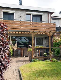 Familiennest mit Bahnanschluss: Charmantes Mittelreihenhaus in Horneburg - Horneburg