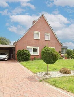 Charmantes Einfamilienhaus mit Garten, Garage und Carportstellplatz in Großefehn - Großefehn