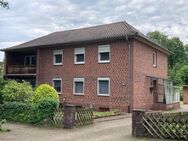 Solides Zweifamilienhaus mit Garagen und großem Grundstück in Schneverdingen, Nähe Höpen - Schneverdingen