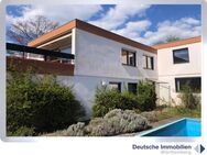 In schöner und ruhiger Wohnlage! Großzügiger Winkelbungalow mit Doppelgarage in Birkmannsweiler - Winnenden