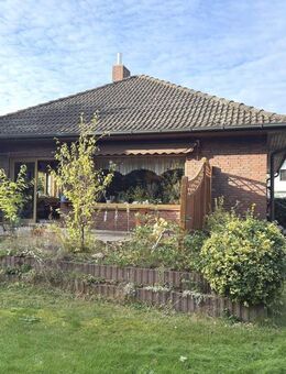 PURNHAGEN-IMMOBILIEN - Charmanter Bungalow mit Terrasse und Garten in Bremen-Farge - Bremen