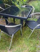 Rattantisch mit 4 Stühlen in 81539