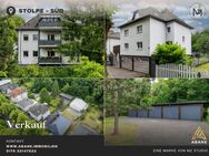 Investor oder Eigennutzer: Vielseitiges Dreiparteienhaus mit 6 Garagen in Stolpe-Süd - Hennigsdorf