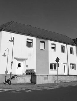 Vermietetes Mehrfamilienhaus mit acht Wohneinheiten in ruhiger Lage von Rommelhausen! - Limeshain