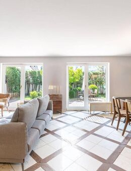 Familienfreundliches Einfamilienhaus mit Garten, Kamin und Wellnessbereich - München
