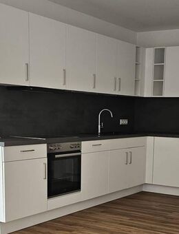 Wohlfühlwohnung im 1. OG mit Balkon, moderner EBK & eleganten Badezimmer - Heldenstein
